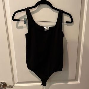 Wolford black scoop neck body suit, medium.
